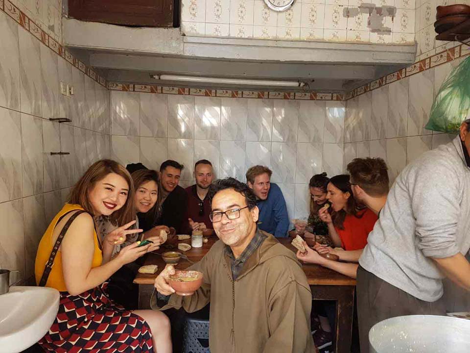 Solo female travelers enjoying vegan food in Marrakech